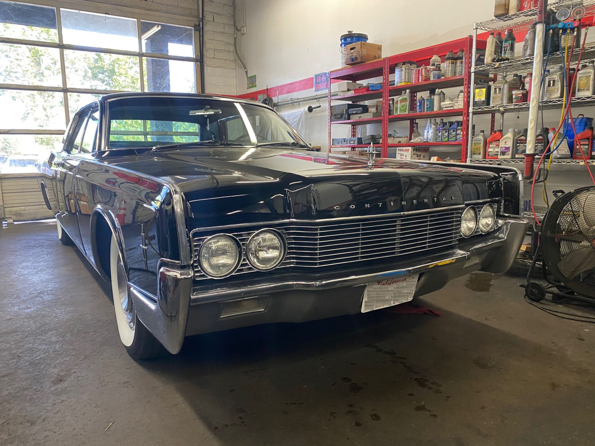 1966 Lincoln Continental at Temecula Auto Repair & Transmission | Temecula Auto Repair & Transmission 1966 Lincoln Continental in the shop at Temecula Auto Repair & Transmission