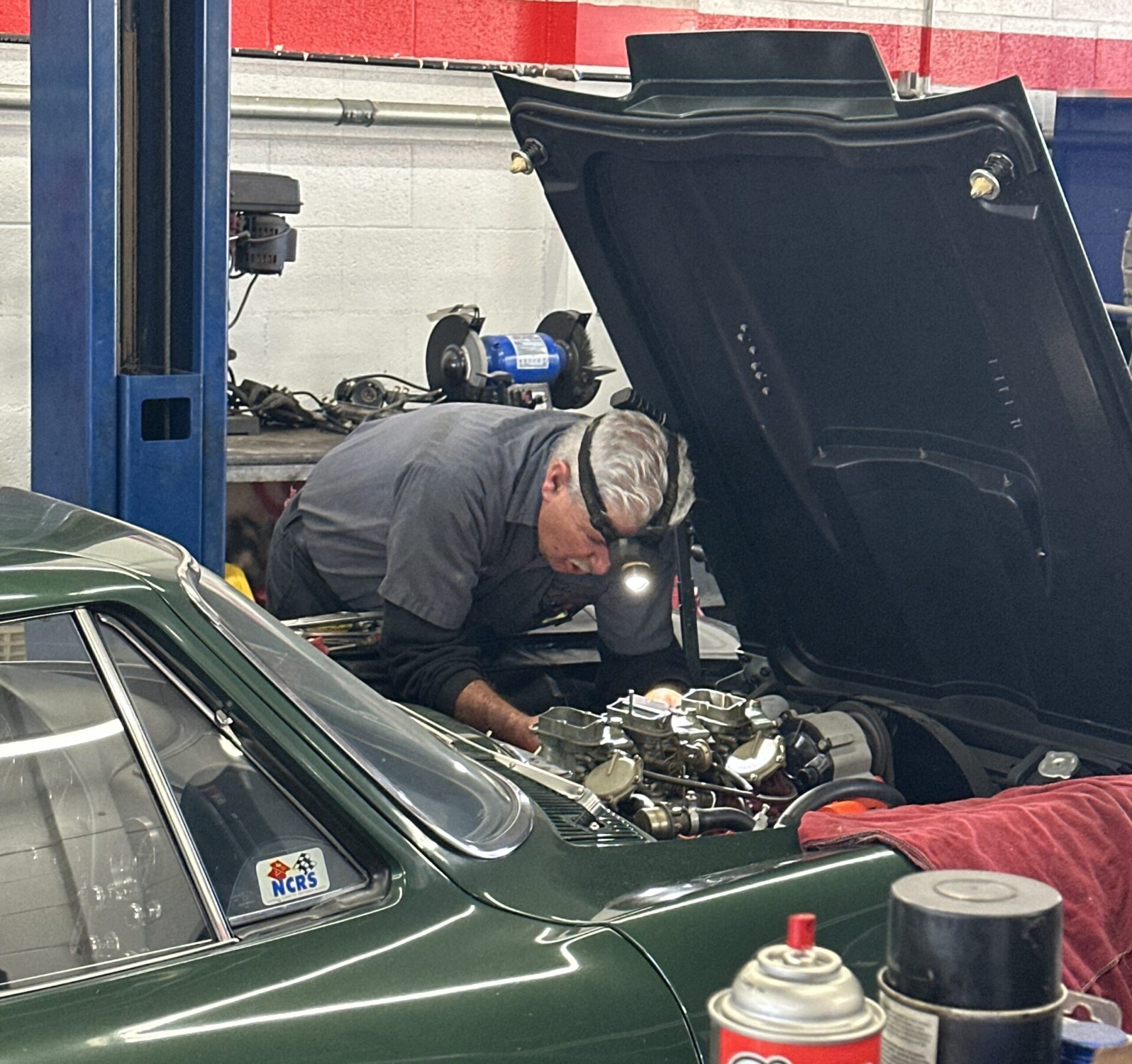 1967 Corvette Temecula Auto Repair | Temecula Auto Repair & Transmission Automotive Technician working under the hood of a 1967 Corvette