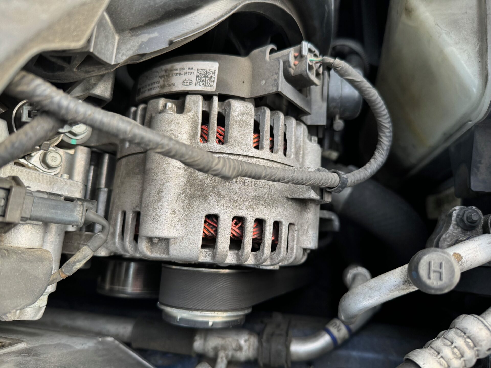 Alternator at Temecula Auto Repair | Temecula Auto Repair & Transmission The hood open on a Hyundai Elantra, showing the Alternator.