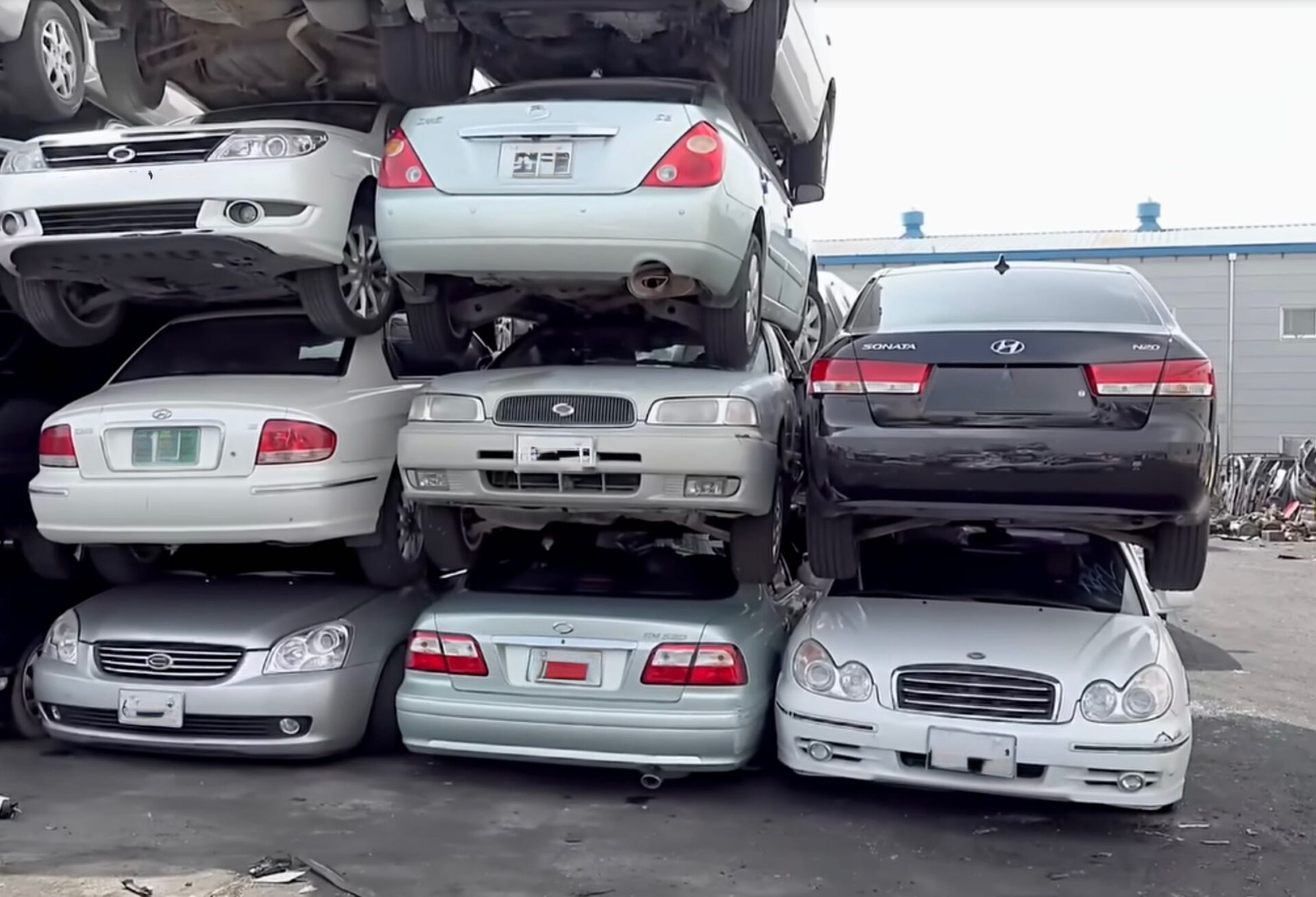 Cars stacked upon one another at the end of their lives.