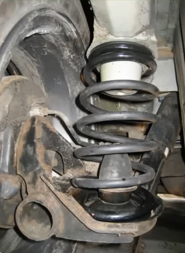 Coil Spring - Temecula Auto Repair & Transmission | Temecula Auto Repair & Transmission Right front suspension with the coil spring in view.