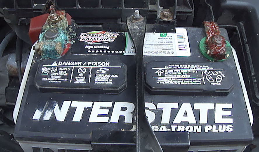 Corroded Battery Cables | Temecula Auto Repair & Transmission Corroded Battery Cables on an Interstate Battery.