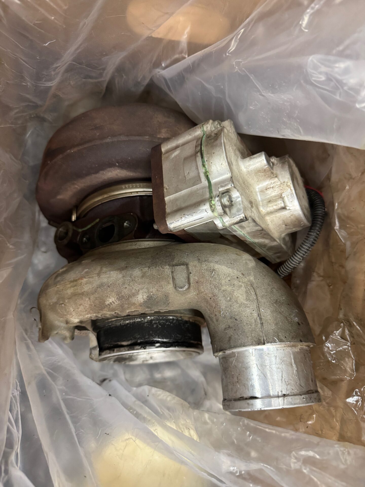 Cummins Diesel Old Turbocharger | Temecula Auto Repair & Transmission An old Cummins Diesel Turbocharger that was replaced will go back as a core.