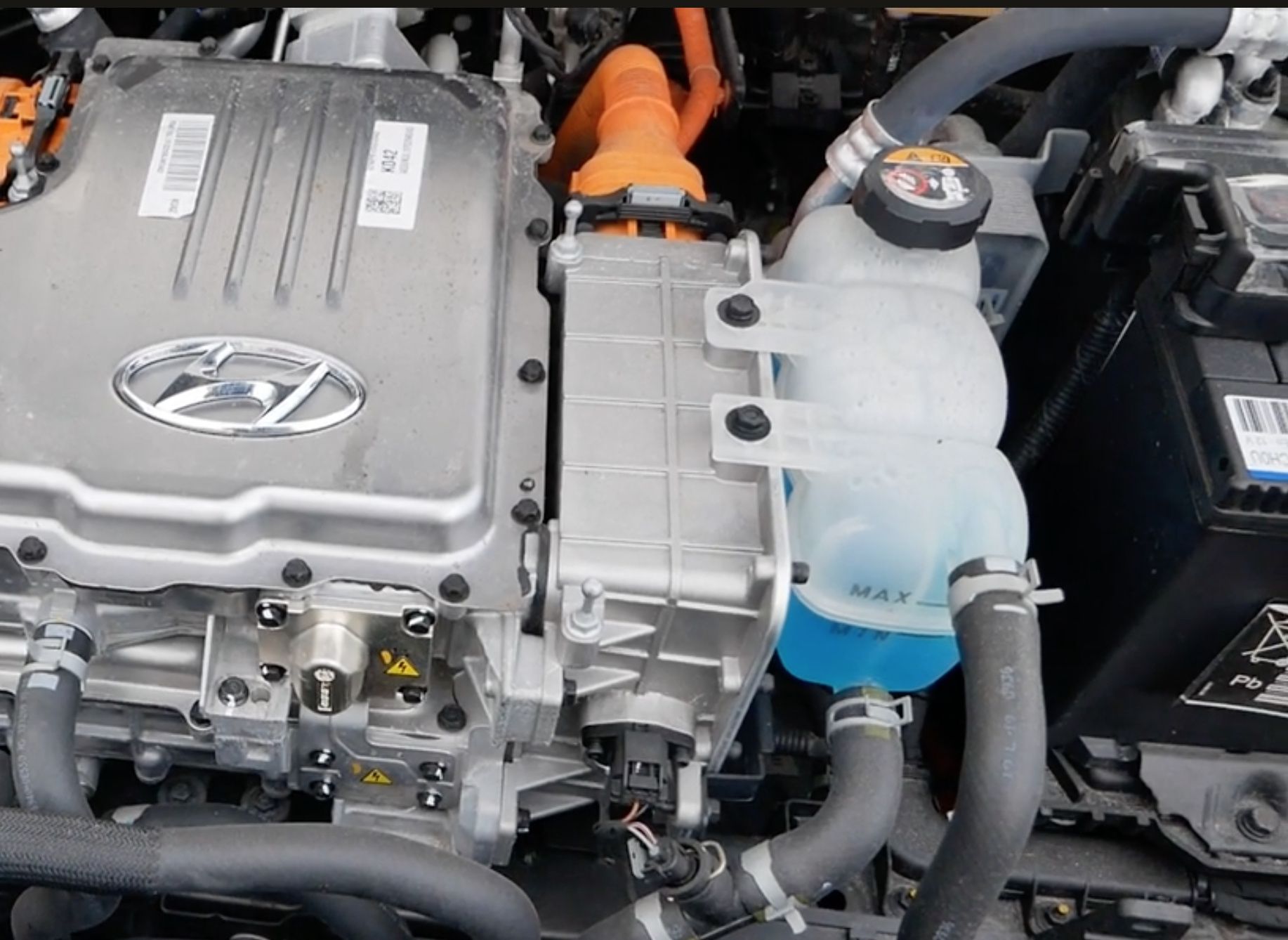 Electric Vehicle Battery Cooling System | Temecula Auto Repair & Transmission The hood is open on a Hyundai Ioniq showing the Electric Vehicle Battery Cooling System.