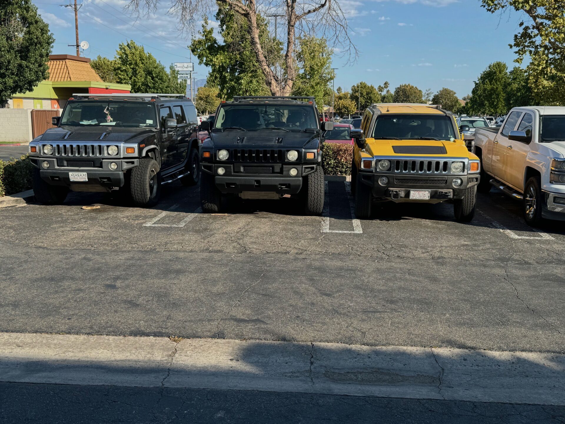 Hummer Service and Repair at Temecula Auto Repair | Temecula Auto Repair & Transmission Row of Hummers, H2 and H3, parked at Temecula Auto repair & Transmission.