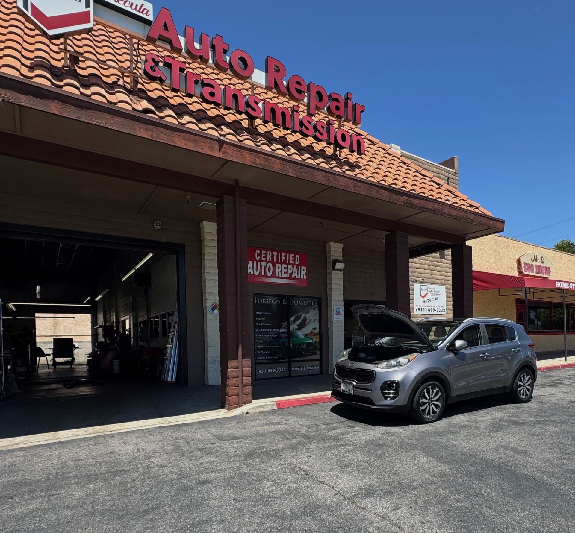 Kia Service Repair in Temecula Murrieta | Temecula Auto Repair & Transmission A kia parked in front of Temecula Auto Repair & Transmission waiting for service.