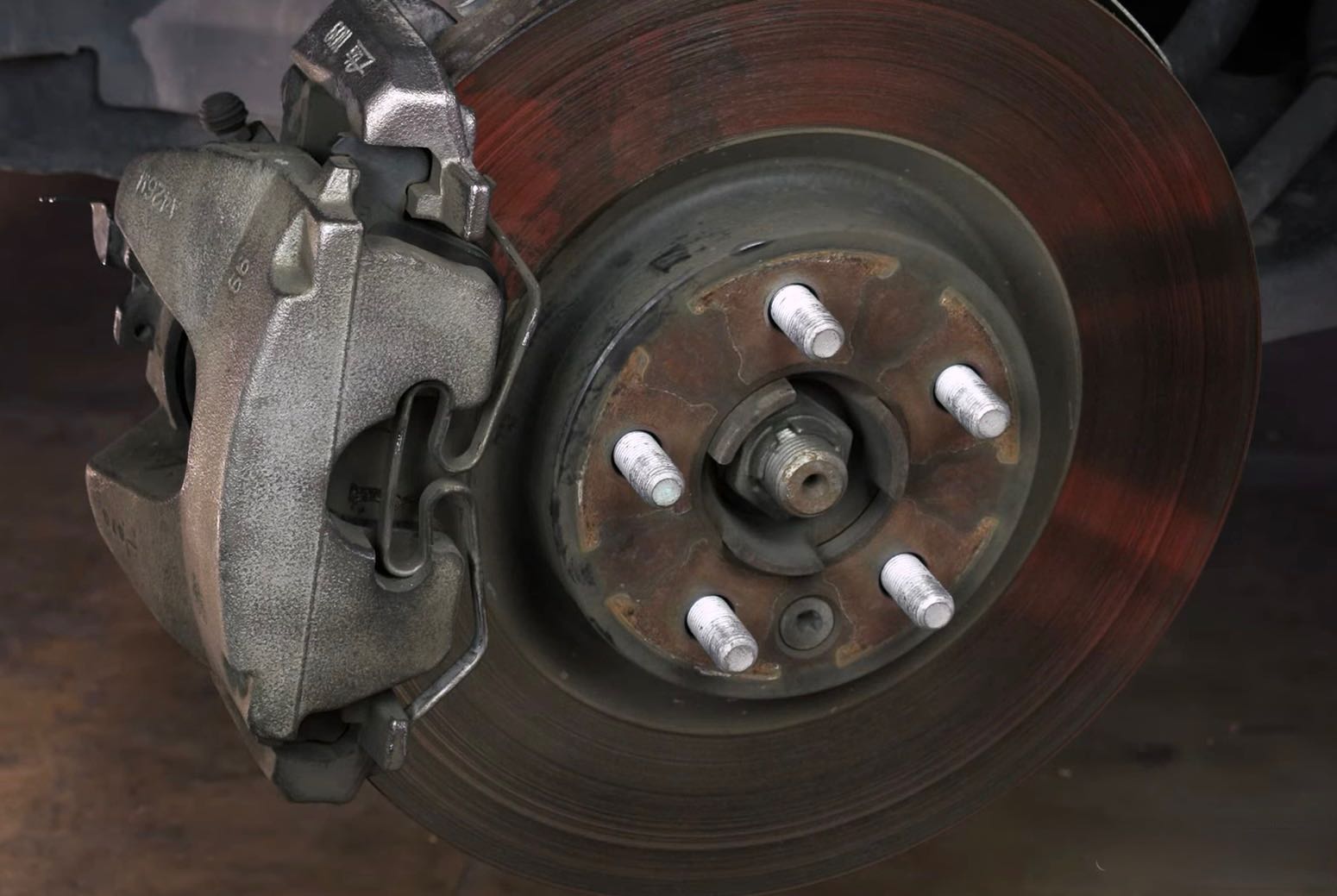 Land Rover Brake Caliper Disc and Pads | Temecula Auto Repair & Transmission The wheels are off on a Land Rover, exposing the Brake Caliper, Disc, and Pads