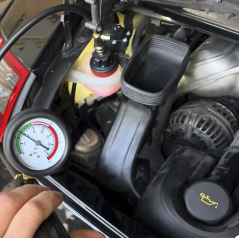 Porsche Cooling System | Temecula Auto Repair & Transmission Porsche cooling system pressure test in progress.