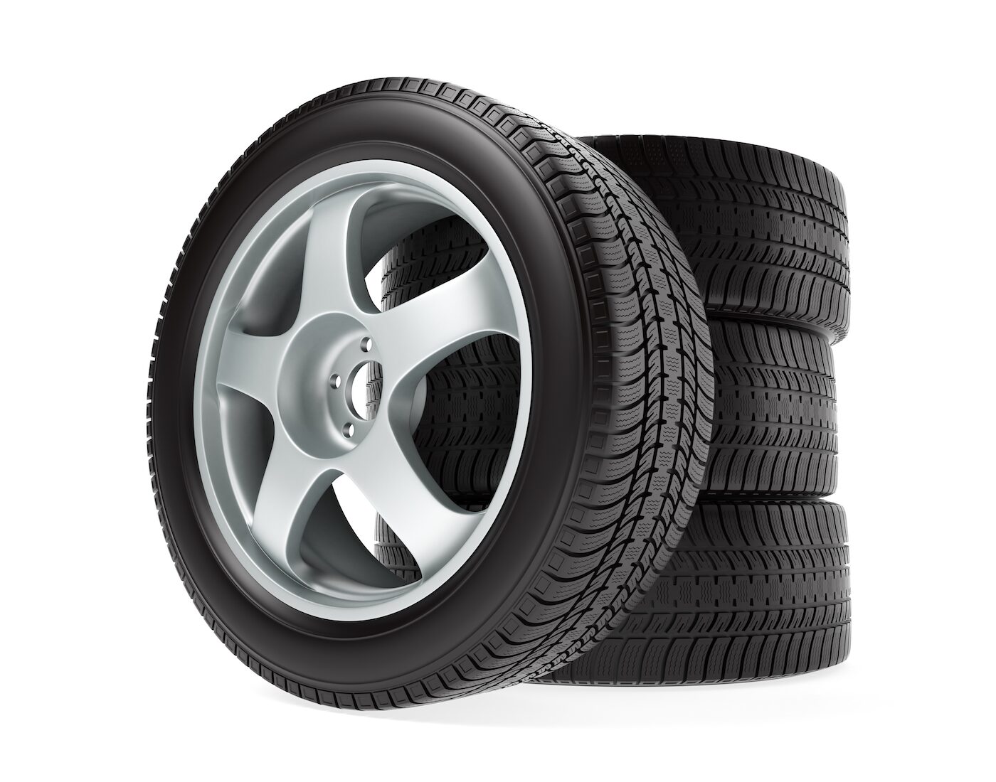 TIRES - Stack Reduced Image | Temecula Auto Repair & Transmission A stack of 4 tires mounted to alloy wheels.