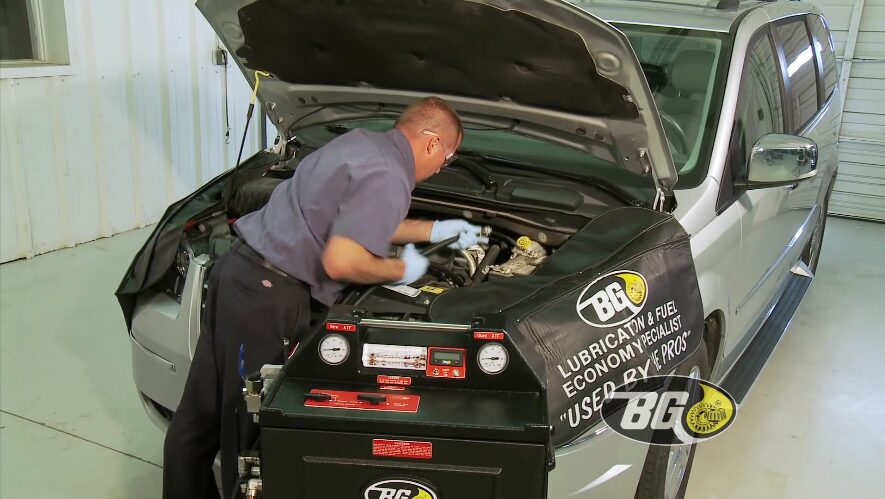 TransFlush | Temecula Auto Repair & Transmission Automotive Technician performing a Transmission Fluid Flush