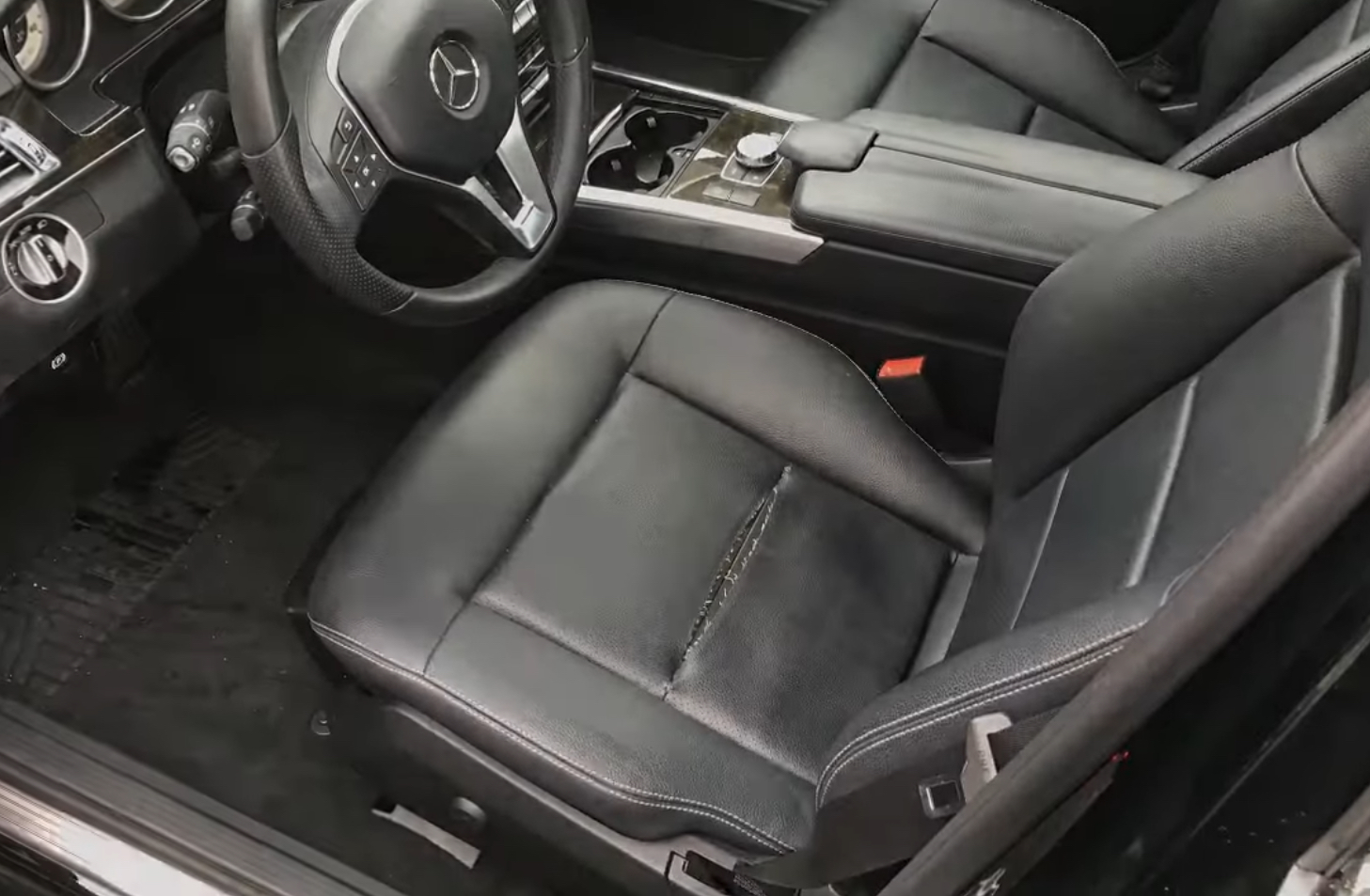 Used Car Inspection of Mercedes Benz Torn Seat | Temecula Auto Repair & Transmission A used Mercedes Benz for sale with a torn driver's seat